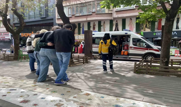 Mağazada yere düşen kadın yaralandı