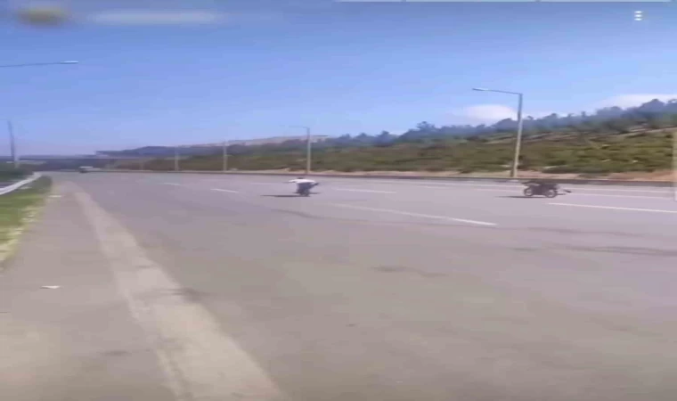 Otobanda motorun üzerine uzanarak ölüme yarış pahalıya patladı