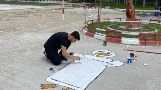 Gediz SHMYO öğrencilerinden ilkokul bahçesine renkli çizimler