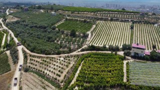 Tarsusta sel sonrası bozulan yollar onarılıyor