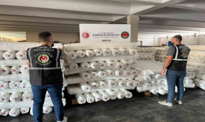 Mersinde 9 milyon 300 bin lira değerinde kaçak polyester kumaş ele geçirildi