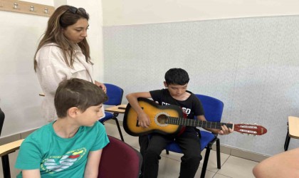 Müziğin notaları Hacılardan yükseliyor