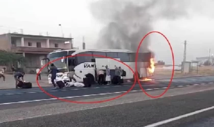 Yanan otobüsten valizlerini almaya çalıştılar