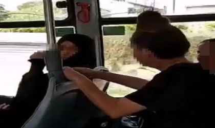 Otobüste çarşaflı kadına hakaret ve küfür iddiasına gözaltı