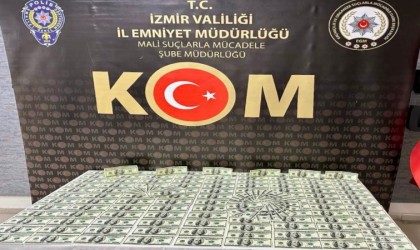 Kalpazanlar döviz bürosunda sahte dolarları piyasaya sürmek isterken yakalandı