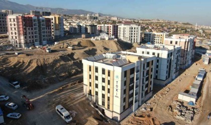 Dış cephe mantolamalarının bitmesiyle vatandaşları cezbeden afet konutlarının teslimine yeni yılla birlikte başlanacak