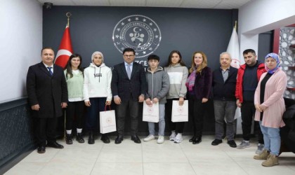 Başarılı sporcular Yazıcı ile bir araya geldi