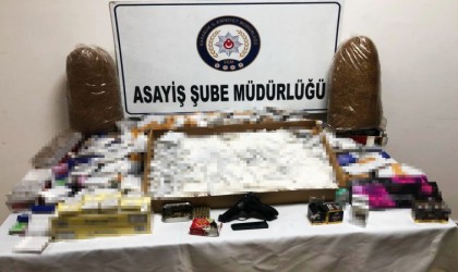 Karabükte ruhsatsız silah ve bandrolsüz sigara ele geçirildi