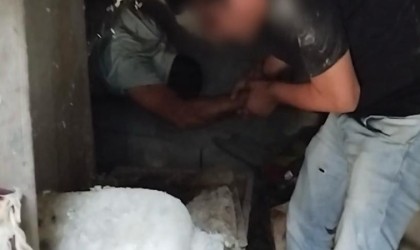 Cezaevi firarisi bidonların arasında yakalandı