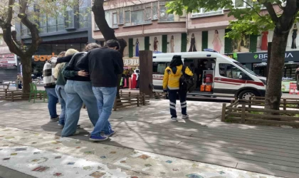 Mağazada yere düşen kadın yaralandı