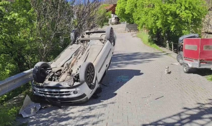 Ters dönen otomobilden yara almadan kurtuldu